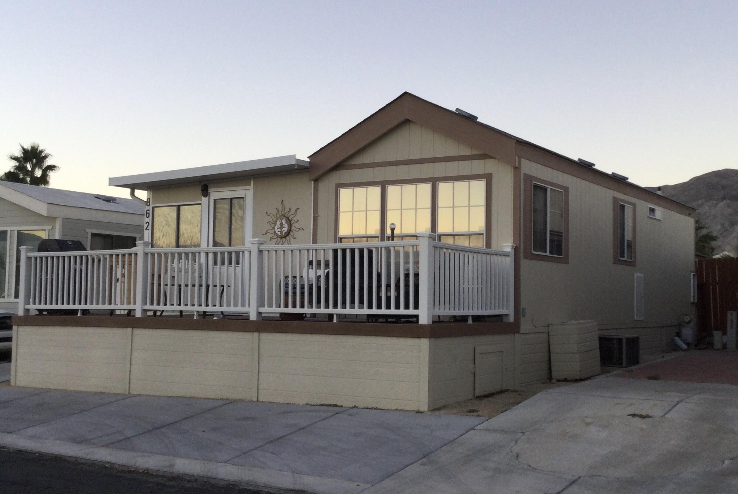 a front view of a house with a garage