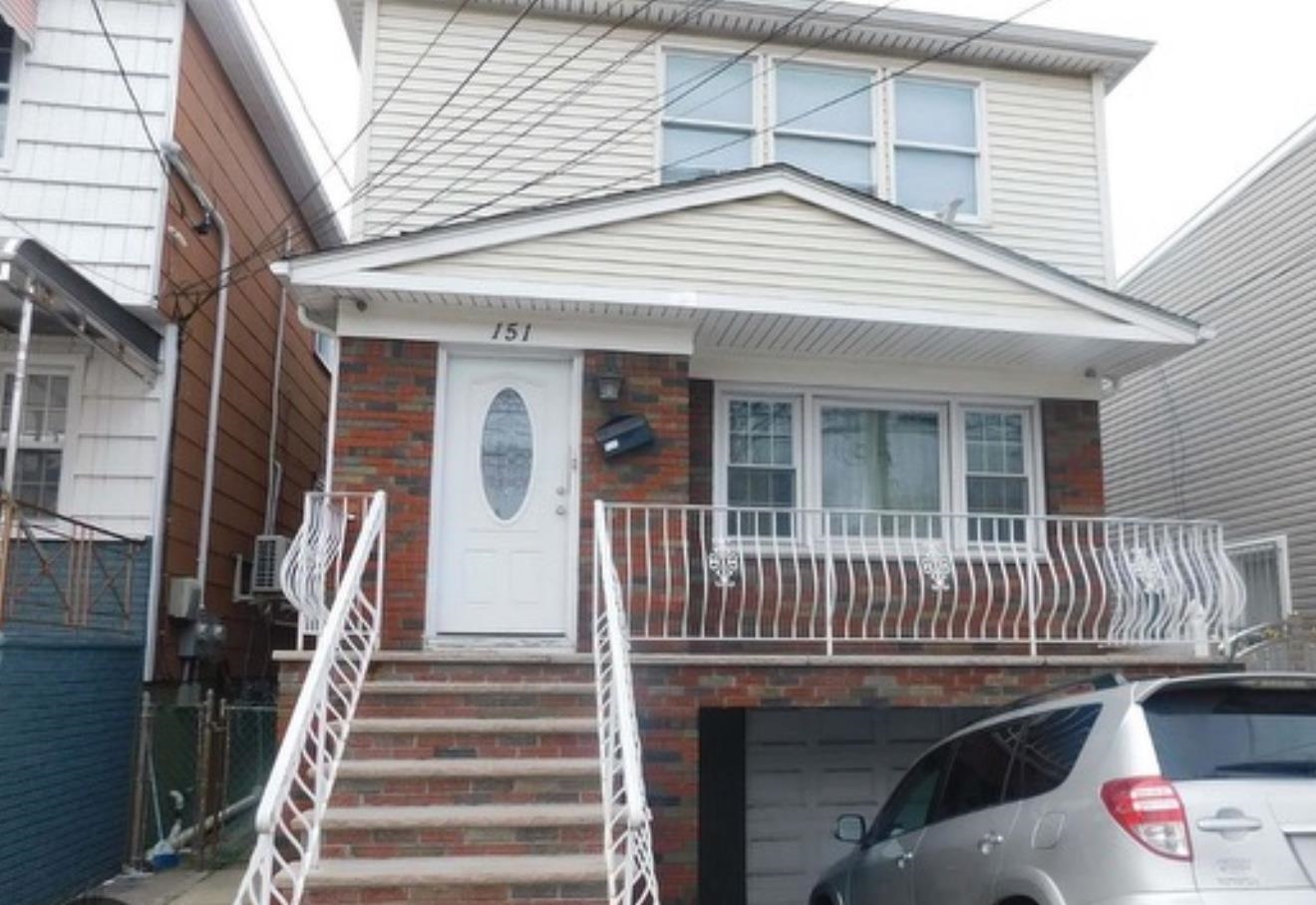 a view of a house with entryway and stairs