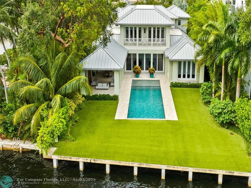 a front view of a house with yard