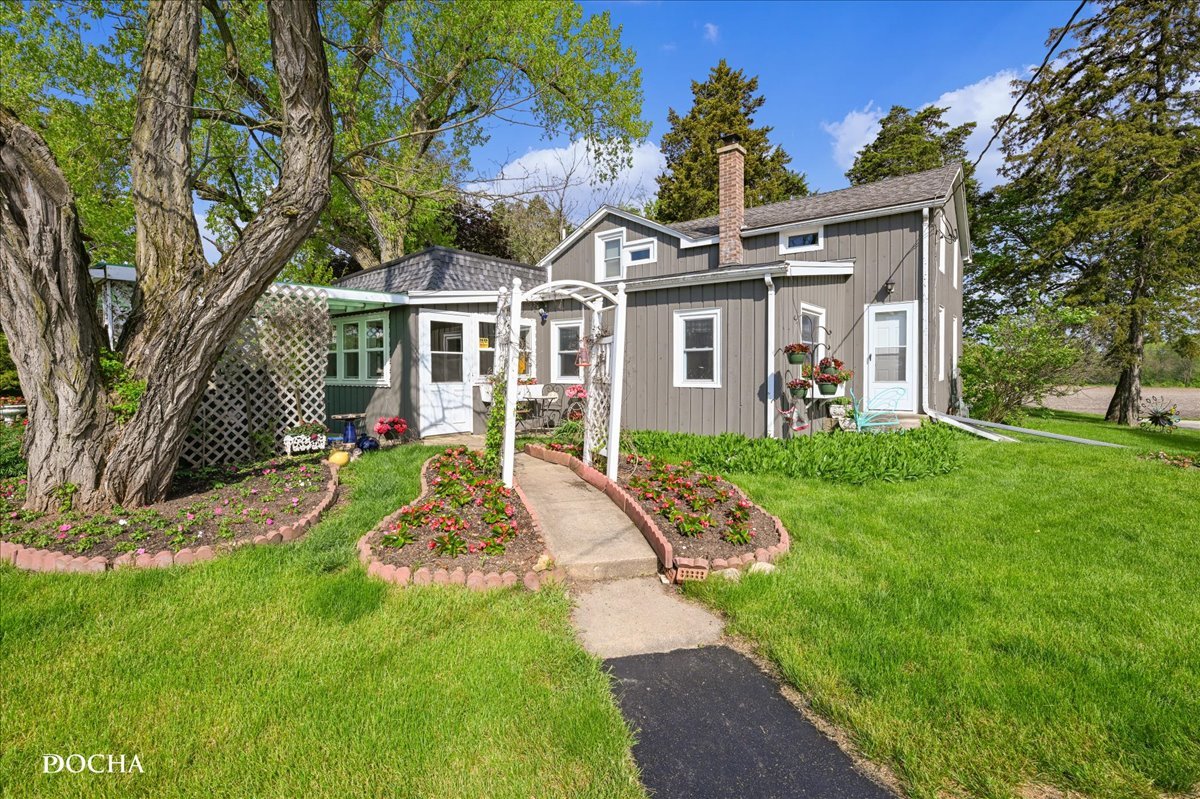 front view of a house with a yard