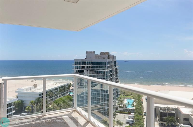 a view of balcony with a flat screen tv