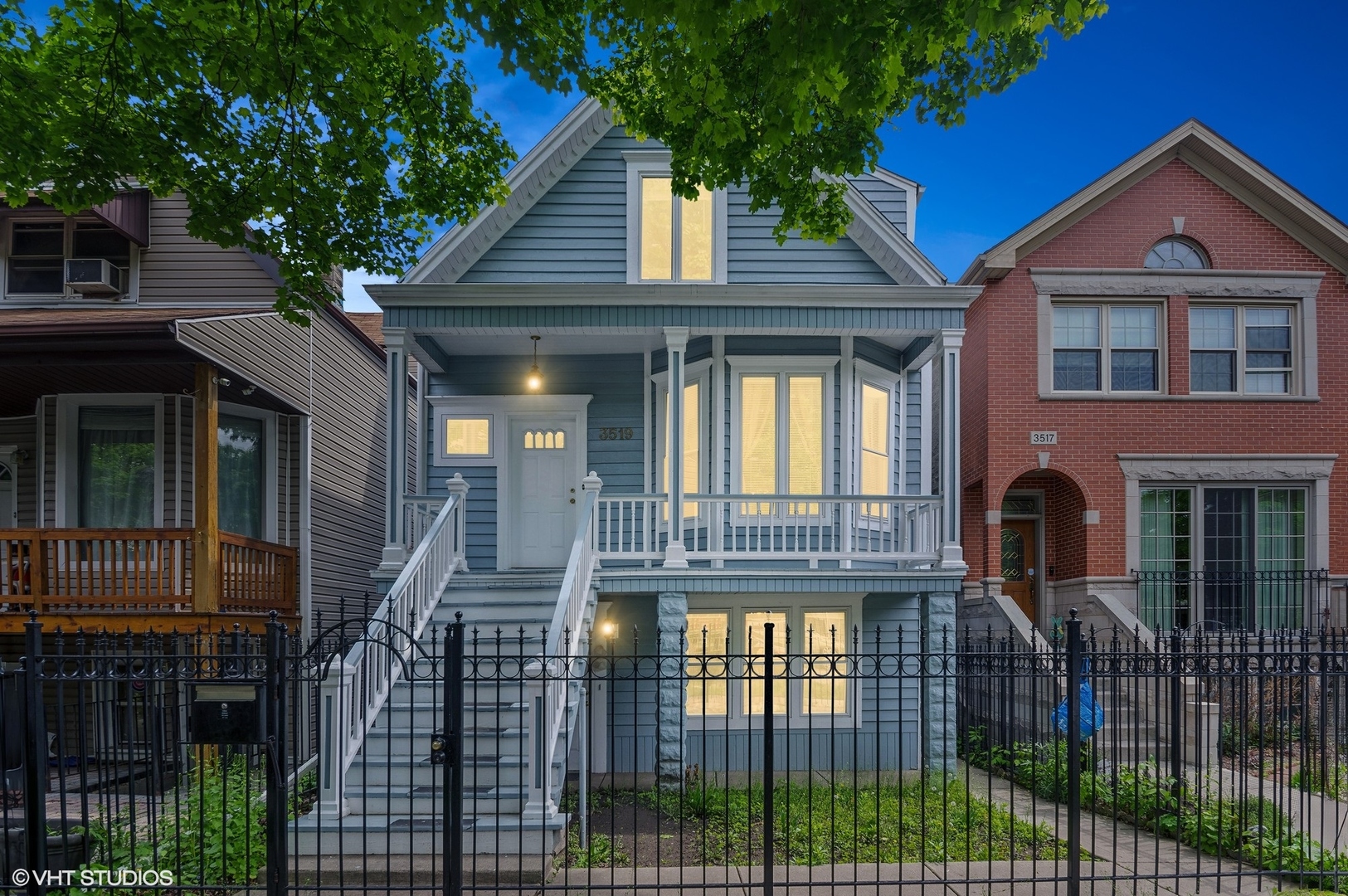 a front view of a house with glass windows