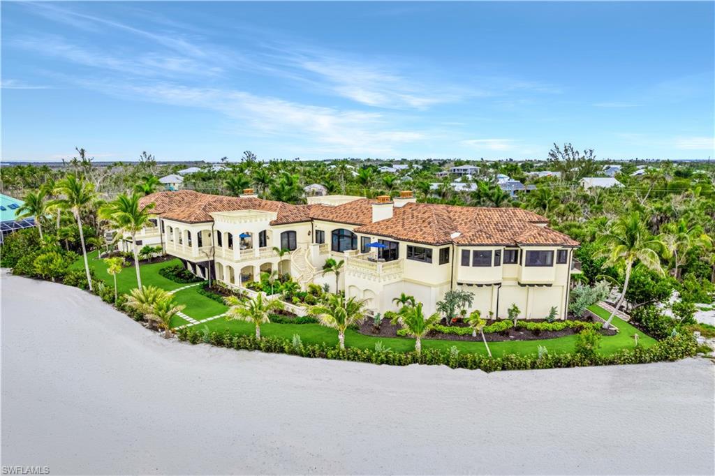 an aerial view of a house with a garden space