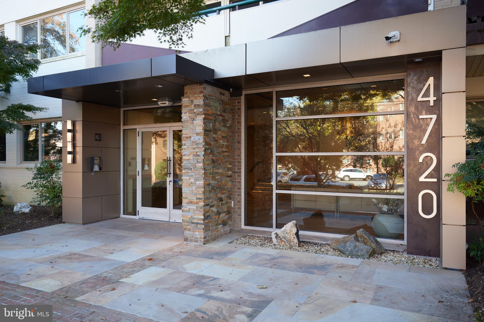 a front view of a building with windows