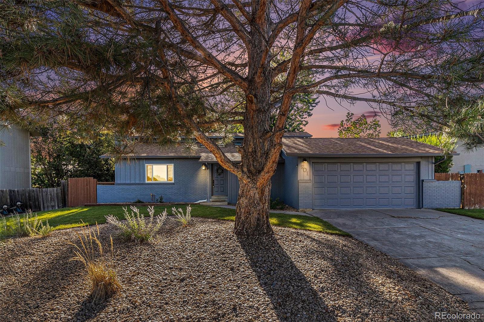 a house with trees in front of it