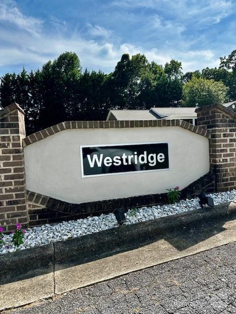 a view of a sign on a road