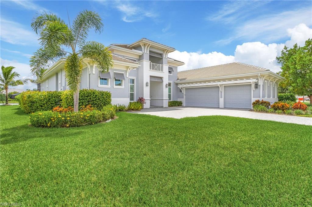 View of front of home featuring a front lawn