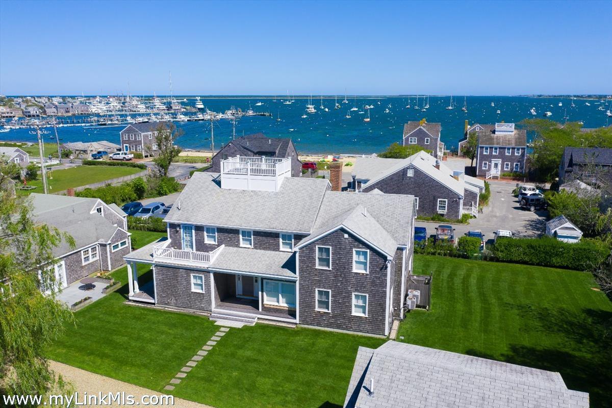 an aerial view of a house with a garden