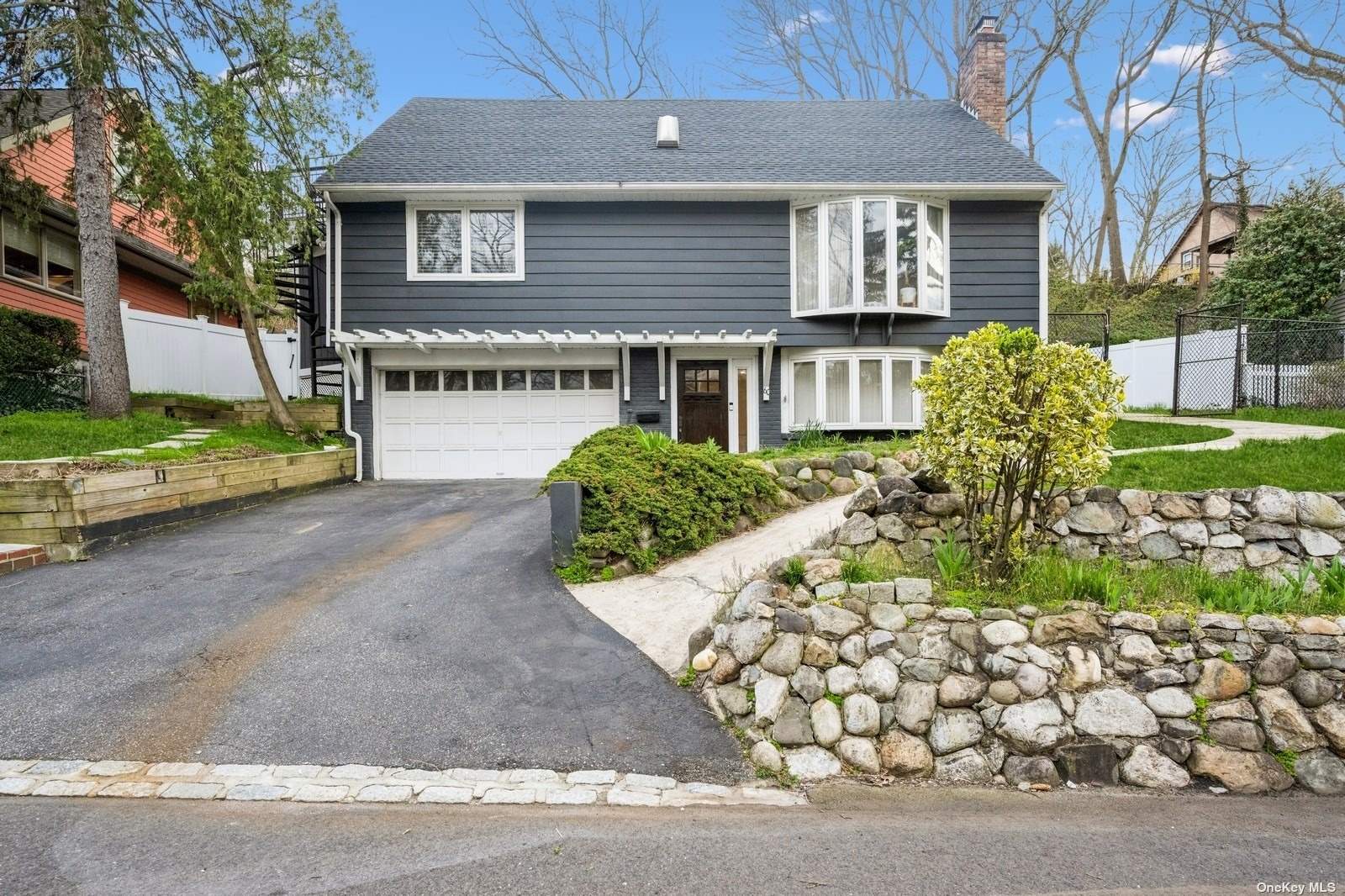 a house view with a garden space