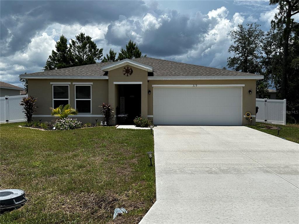 a front view of house with yard