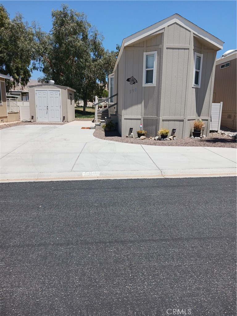 a view of a back yard of the house