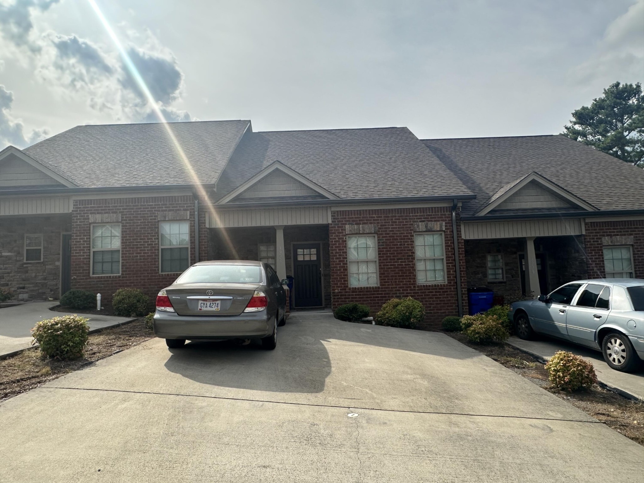 a car parked in front of a house