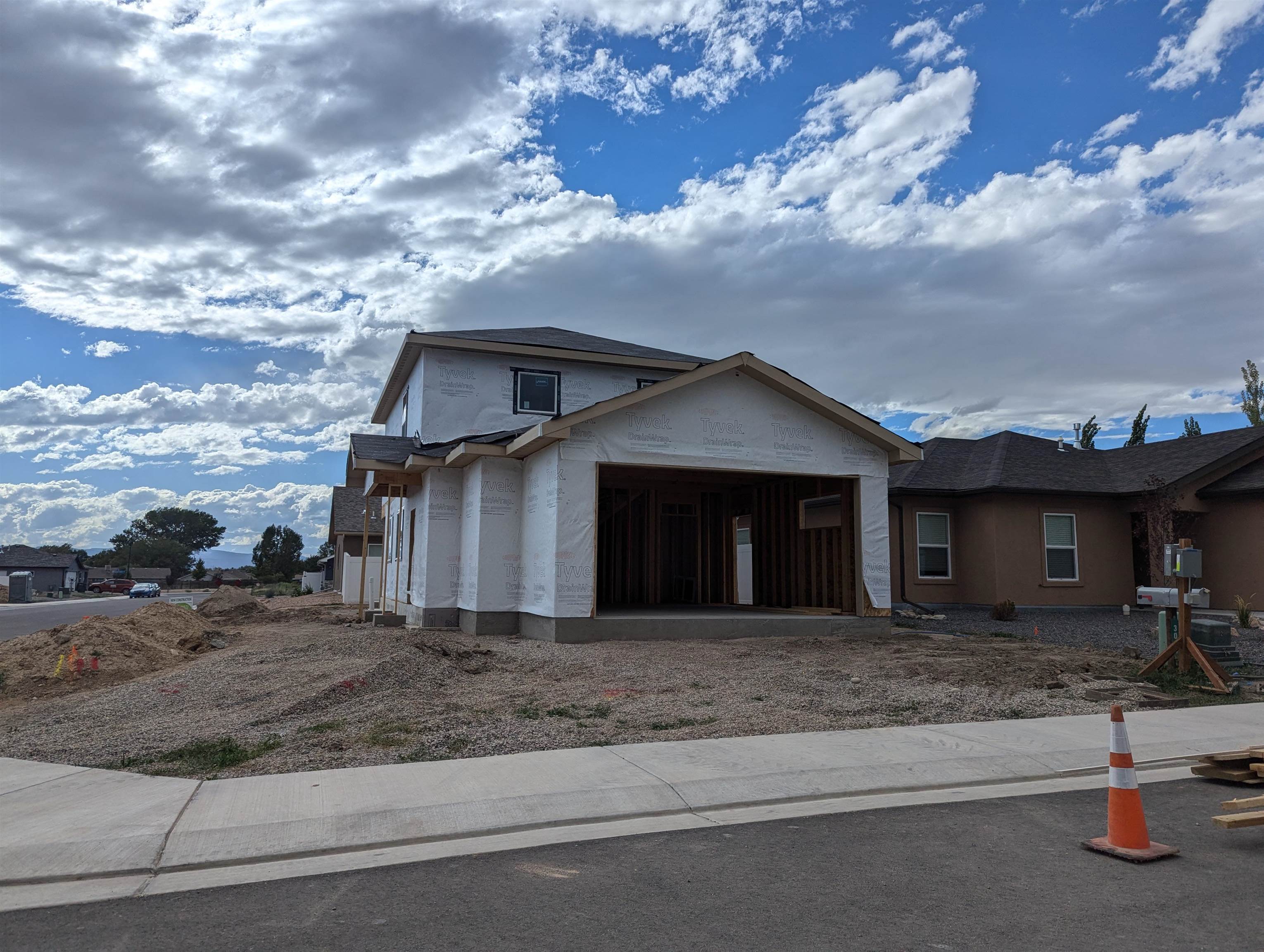 a front view of a house with yard