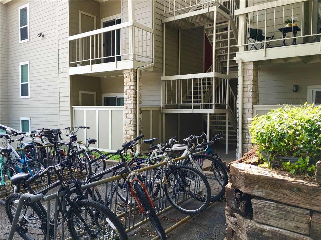 a couple of bicycles parked in front of a house