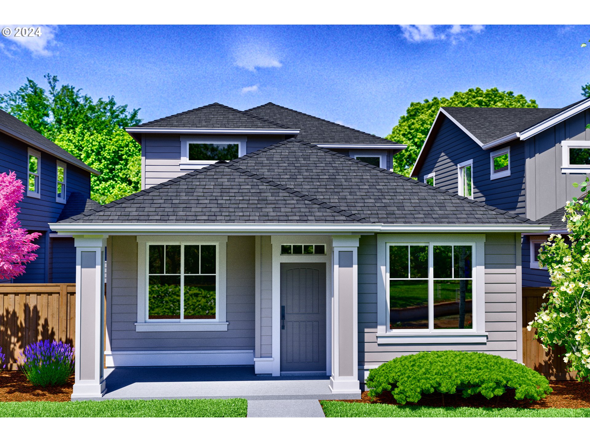 a front view of a house with a yard and potted plants