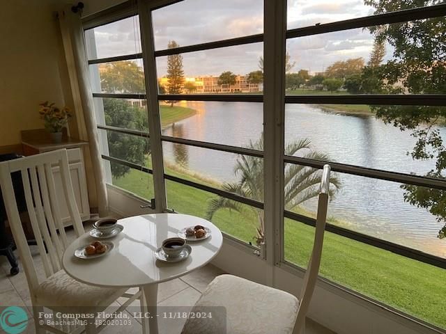 a view of balcony and wooden floor