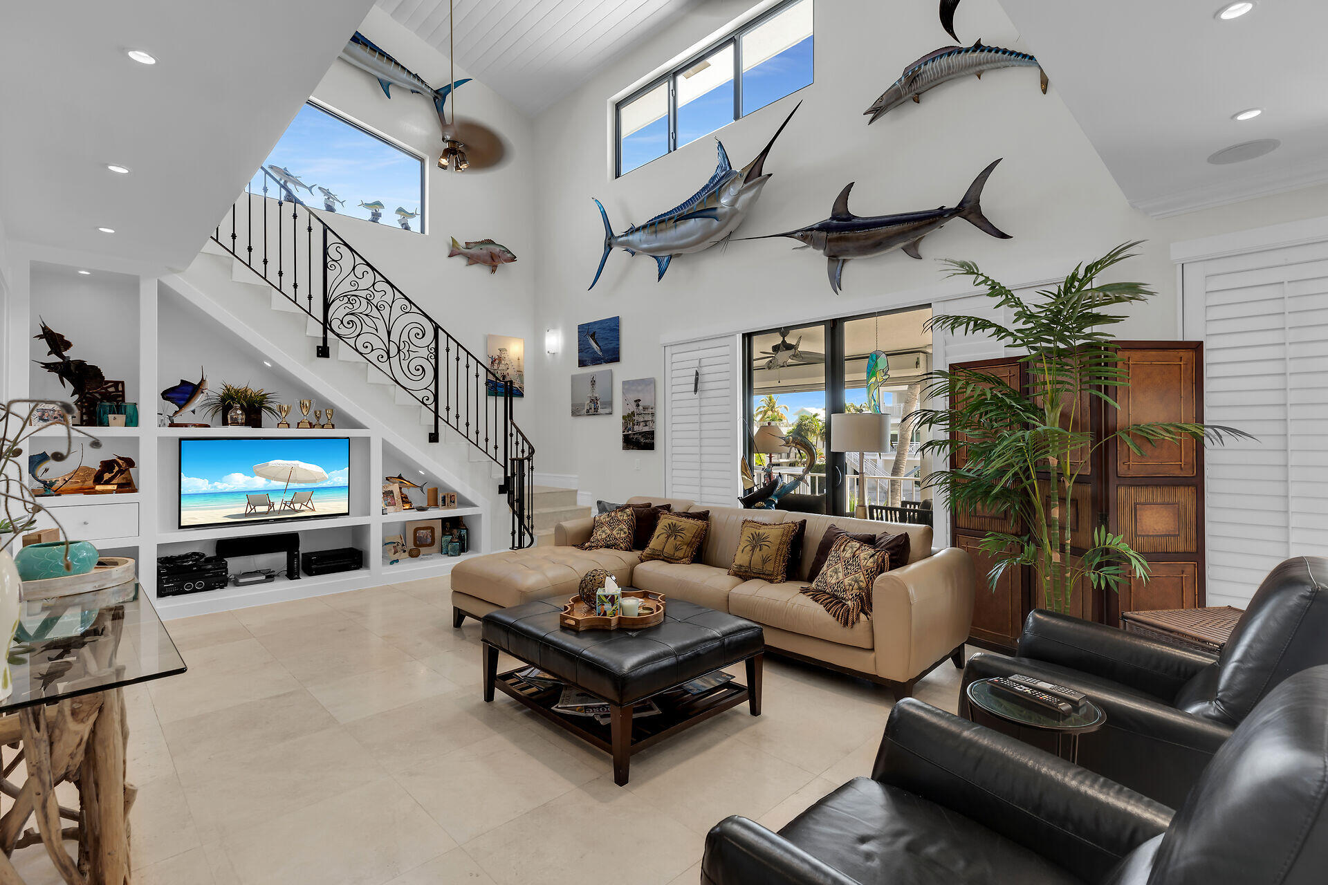 a living room with furniture fireplace and a flat screen tv