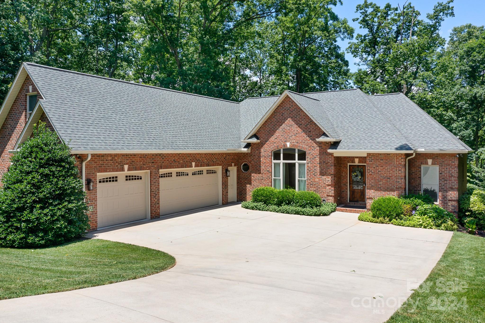 a aerial view of a house with a yard