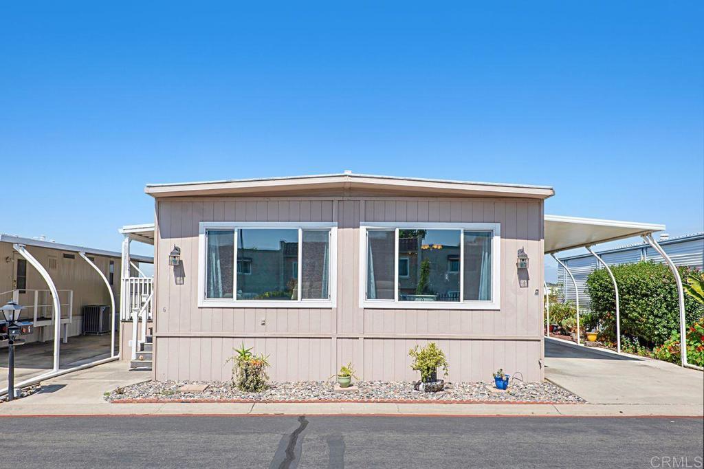 a front view of a house with a garage