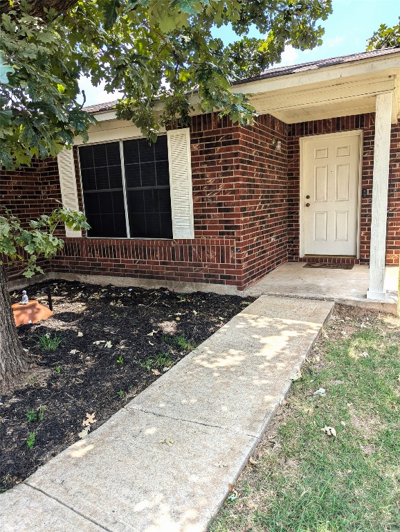 a view of house with backyard and window