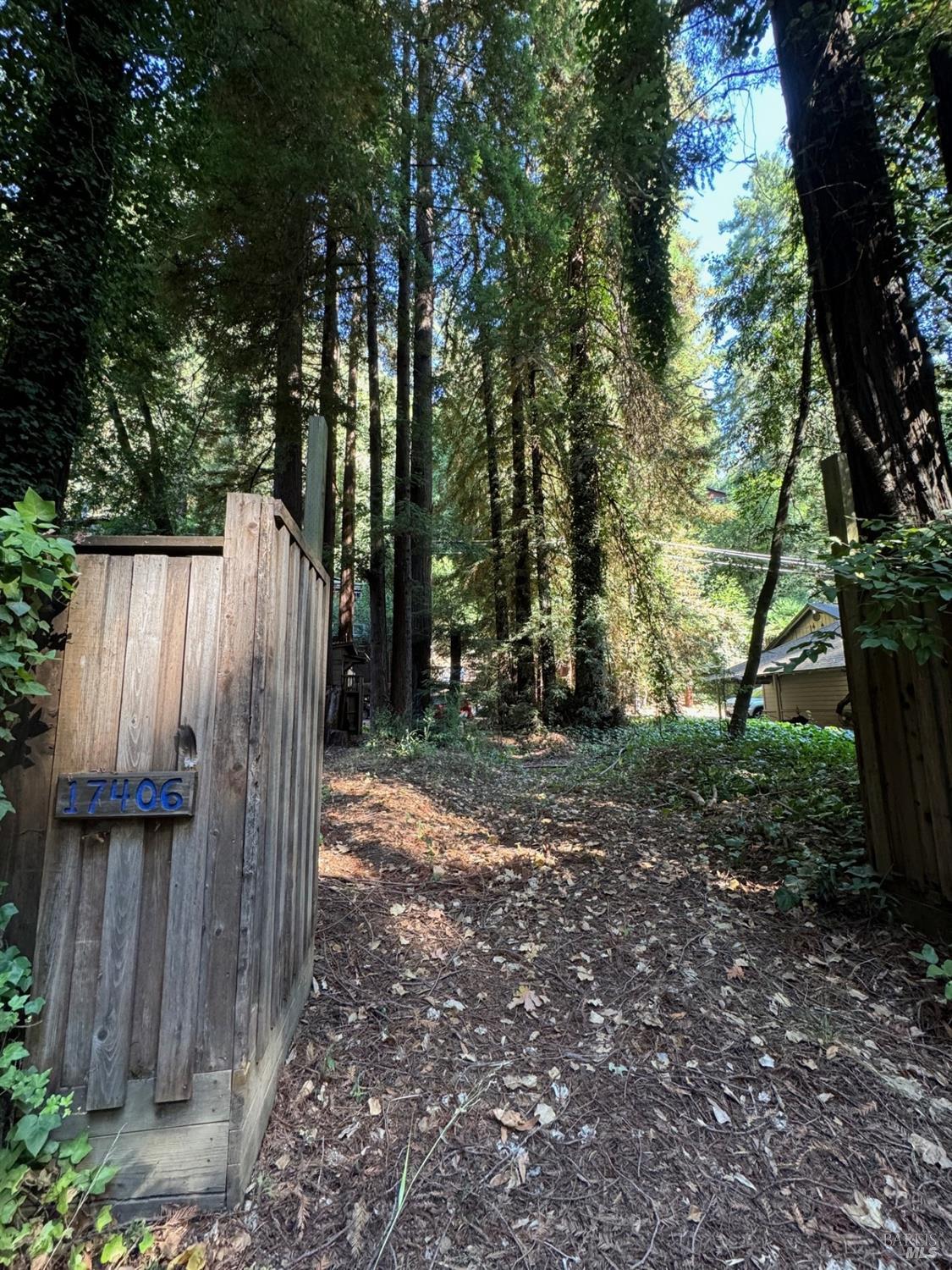 a view of a wooden fence