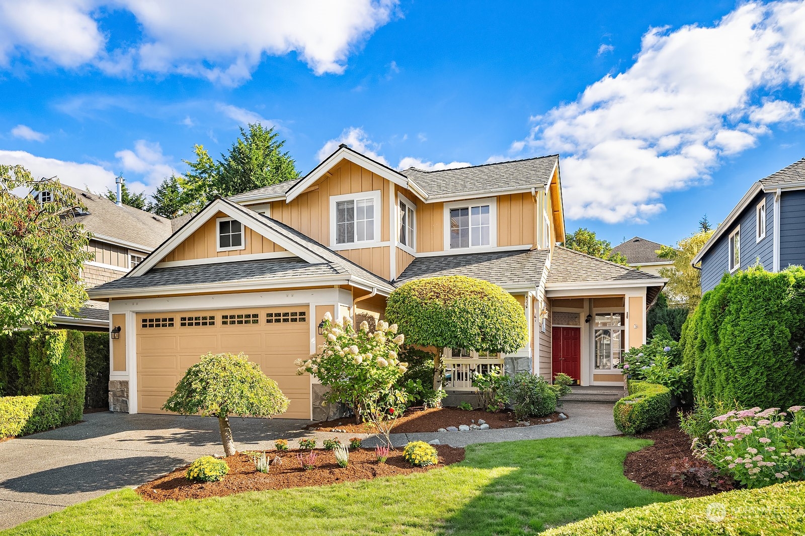 a front view of a house with a yard