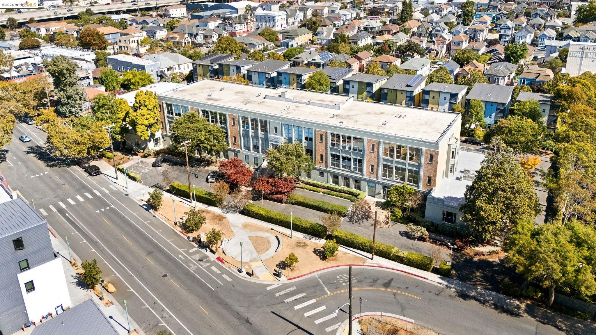 an aerial view of a house with a swimming pool