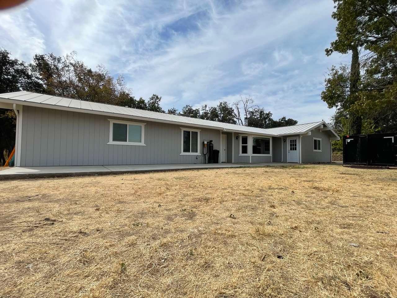 a front view of house with yard