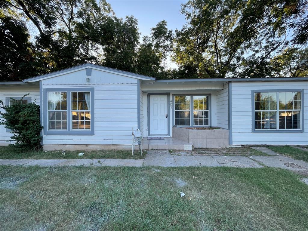 front view of house with a yard