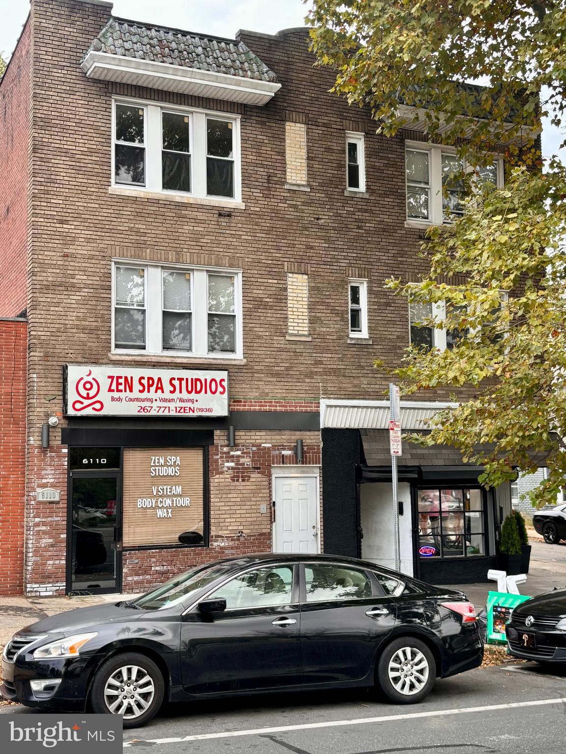 a car parked in front of a building