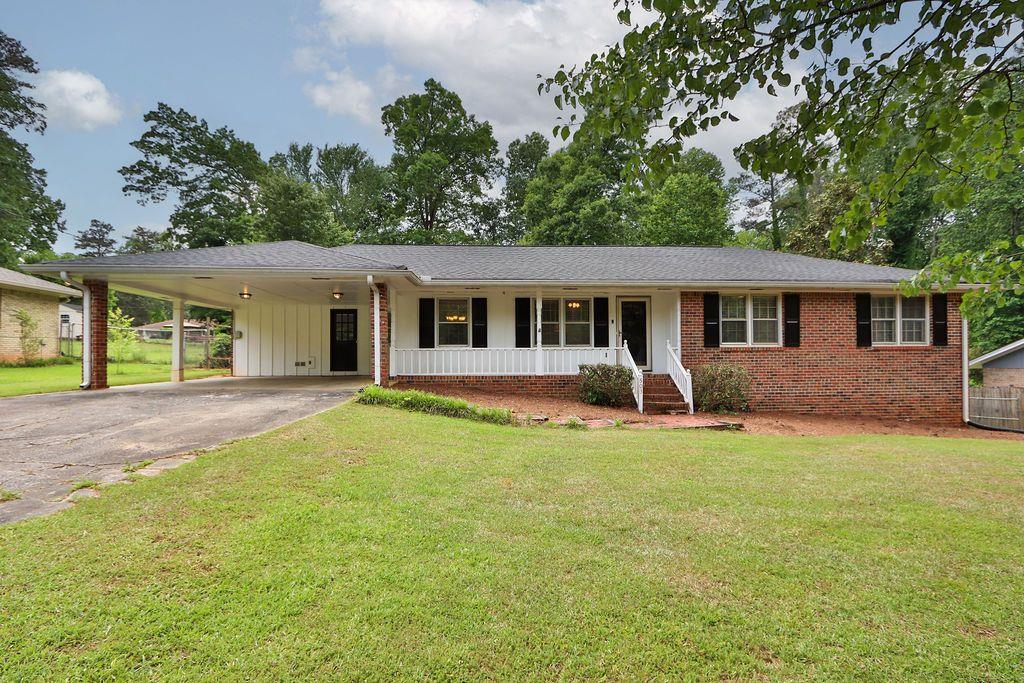 front view of a house with a yard