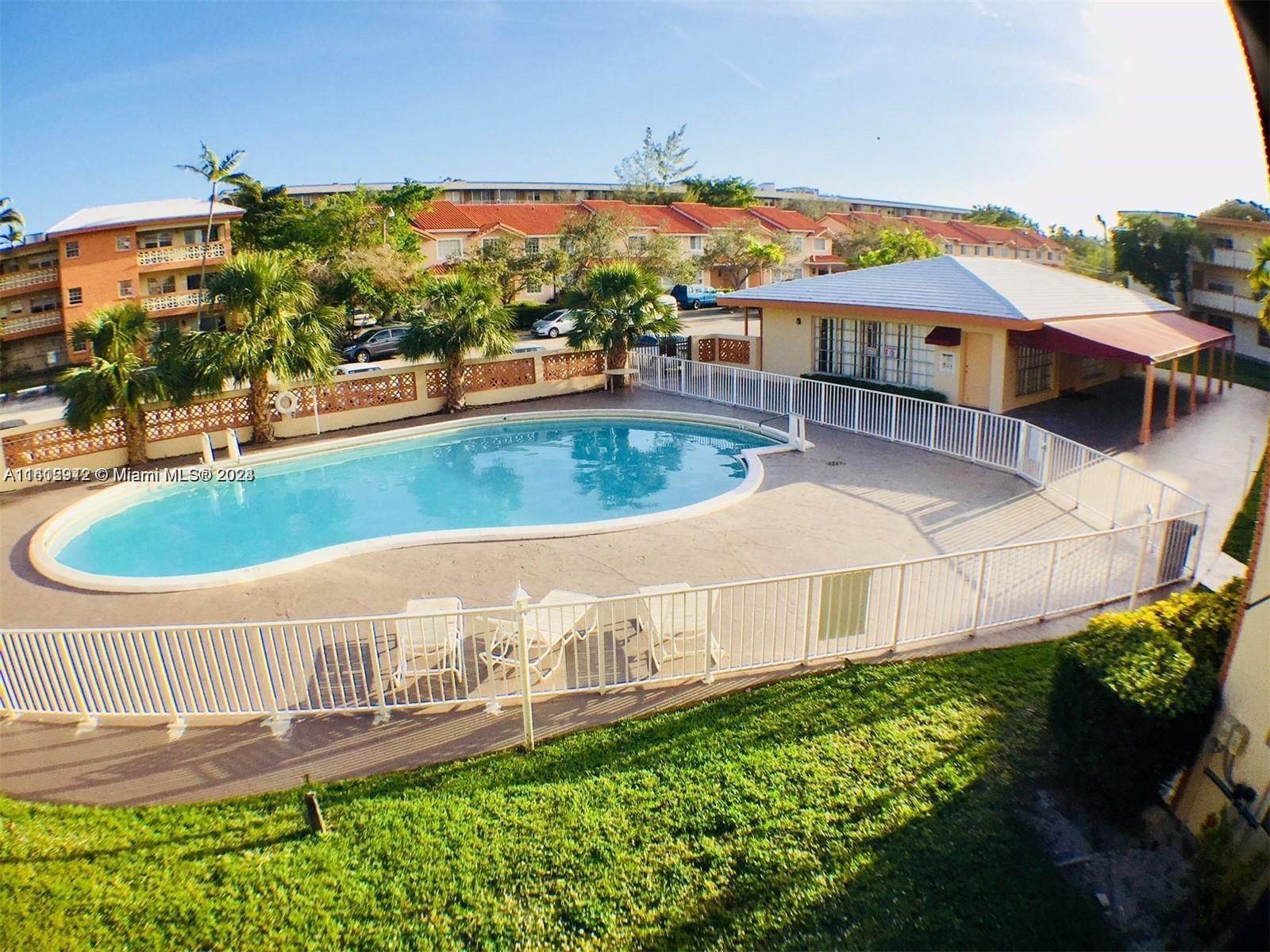 a view of a house with a swimming pool