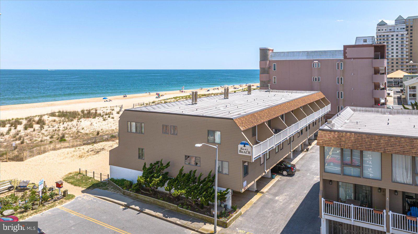 a view of a terrace with a ocean