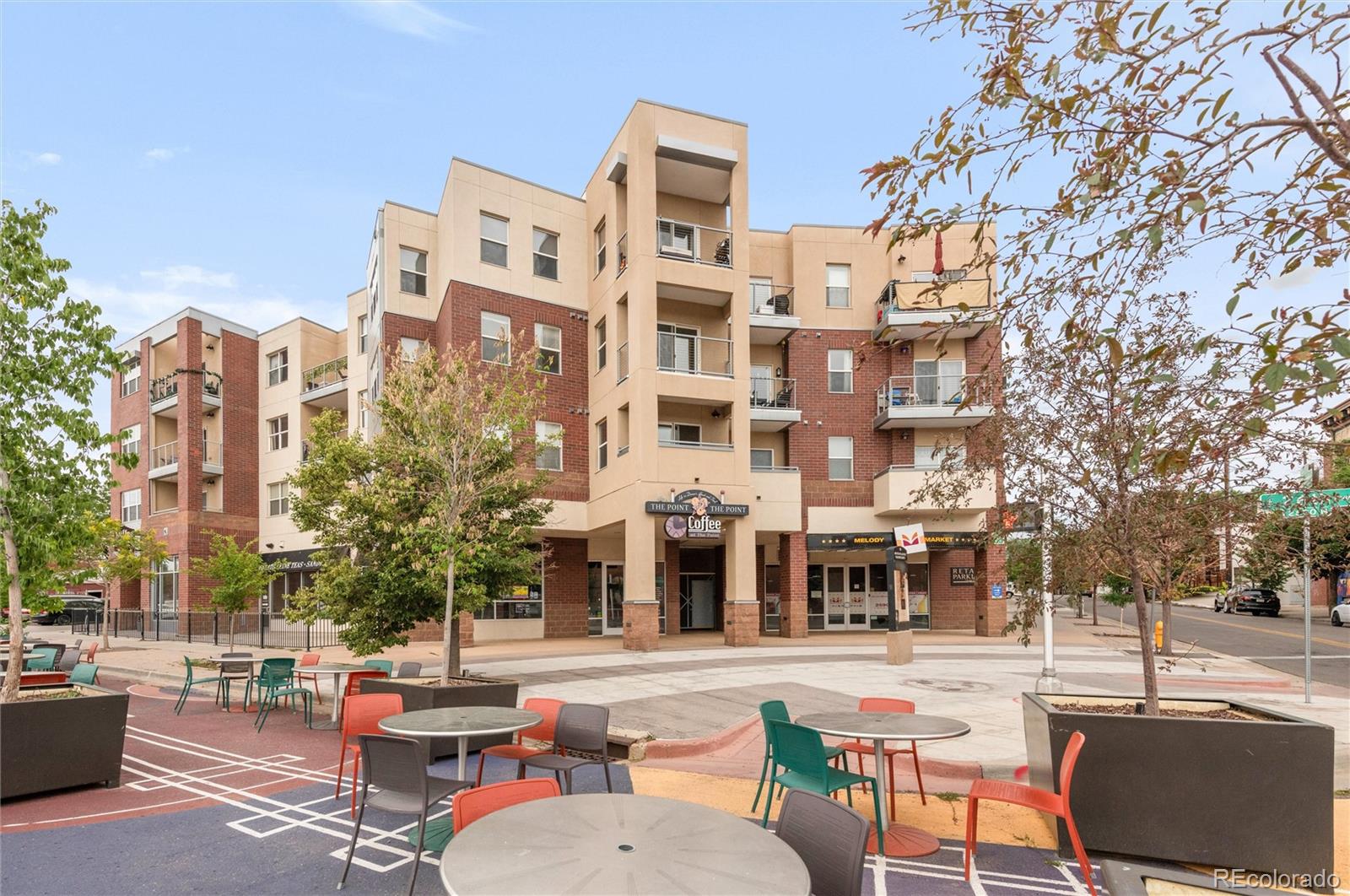 a building outdoor space with patio furniture