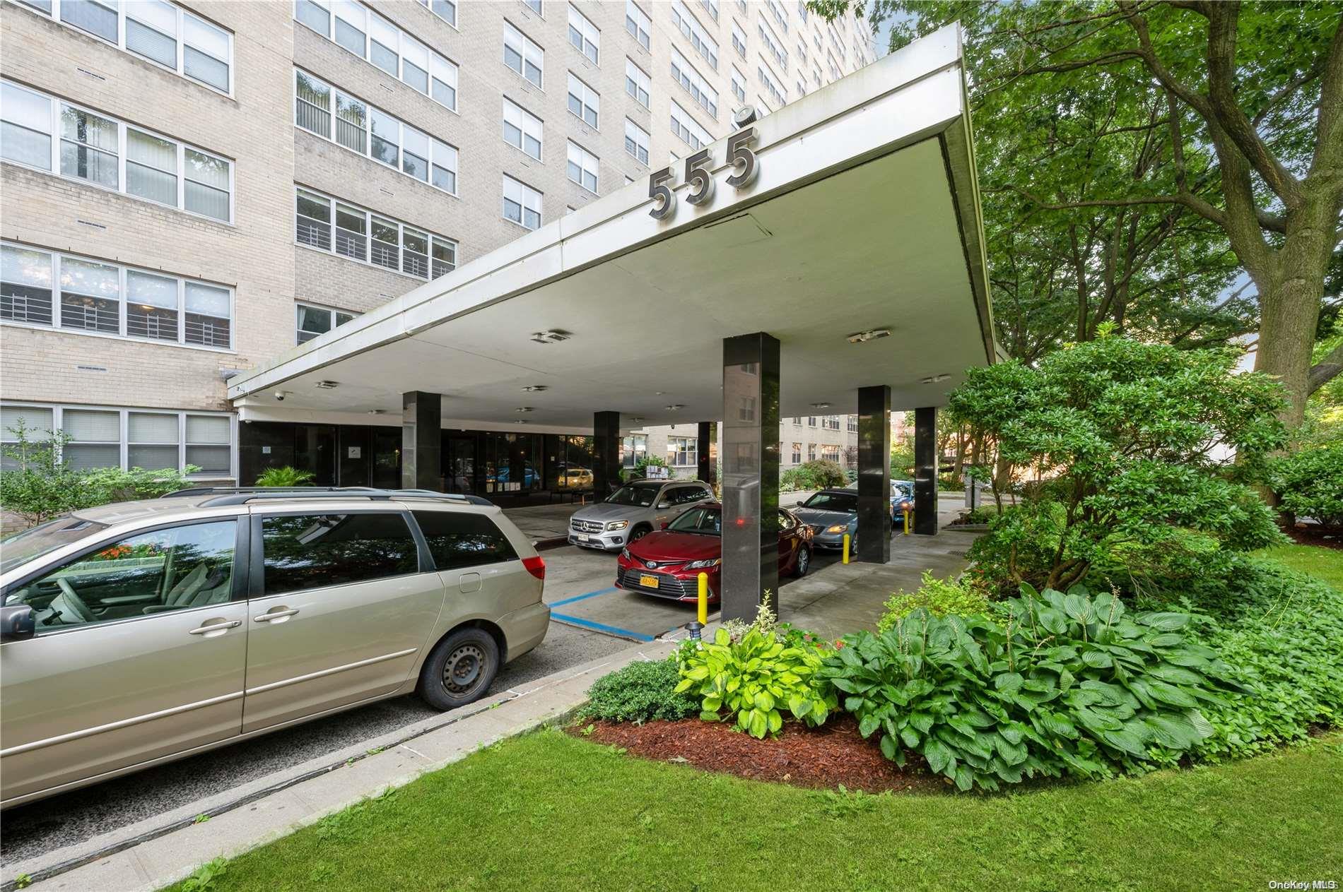 a view of a car parked in front of a building