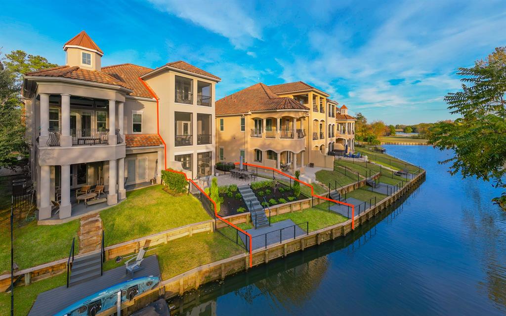 an aerial view of a house with swimming pool