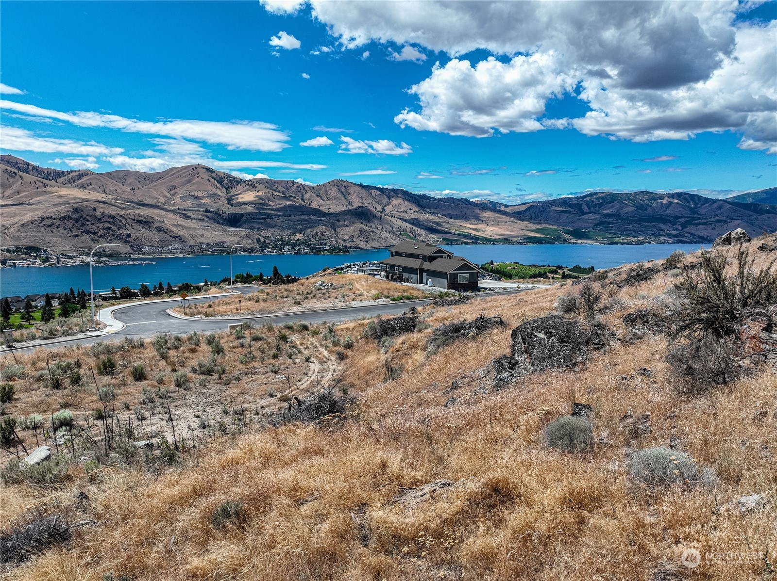 a view of a lake with mountains in the background