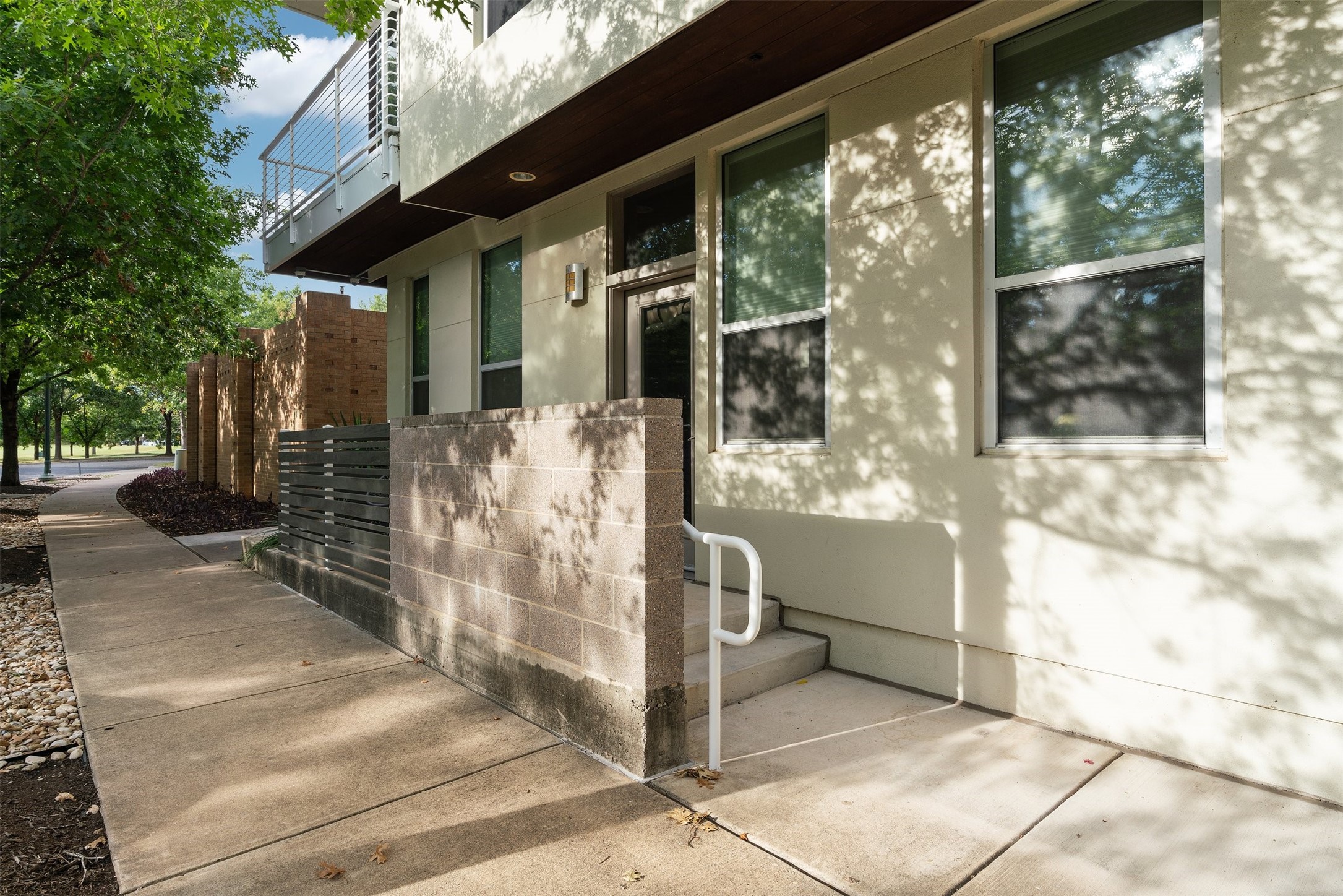 a view of a porch with a tree