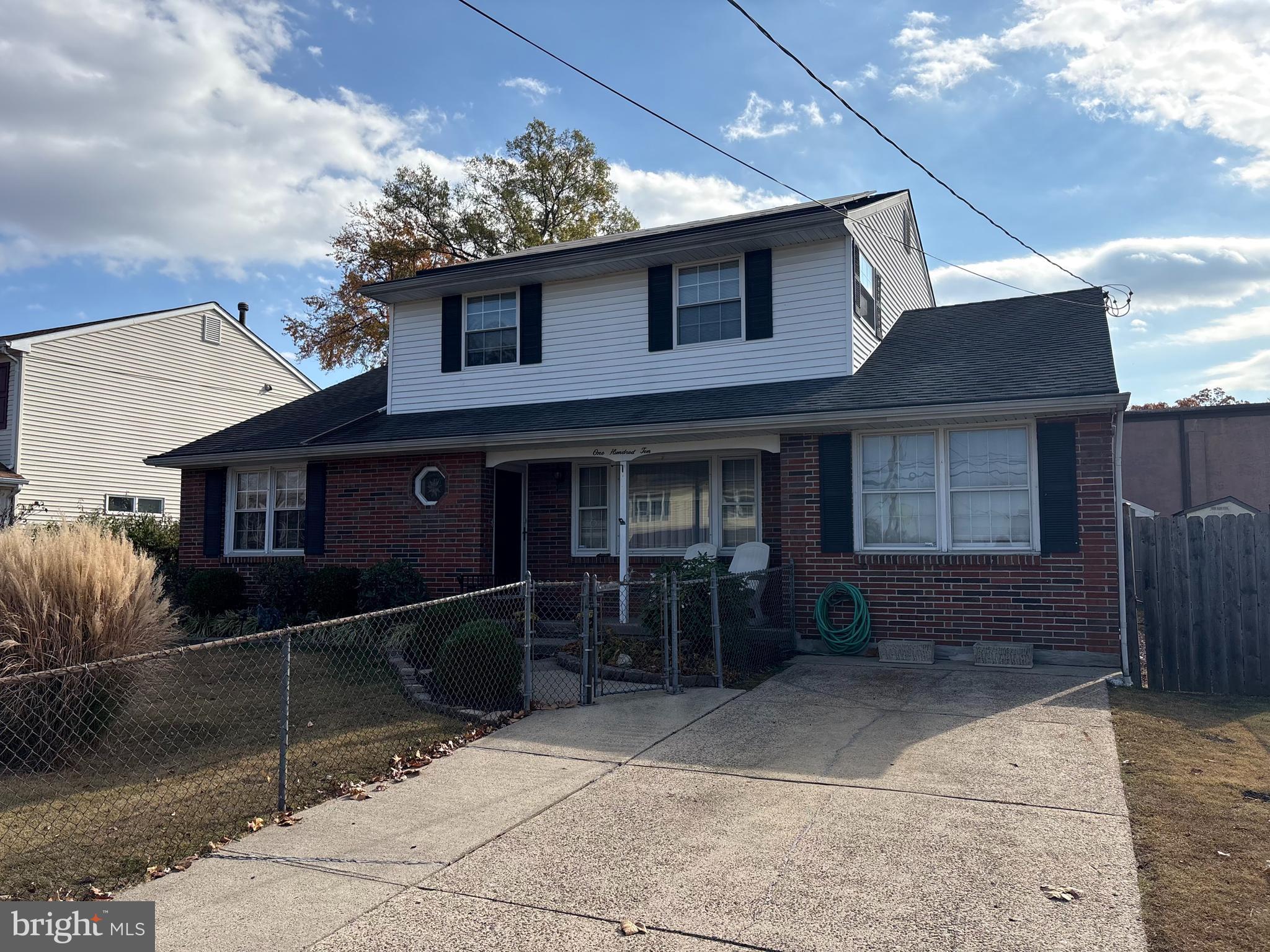 a front view of a house with yard