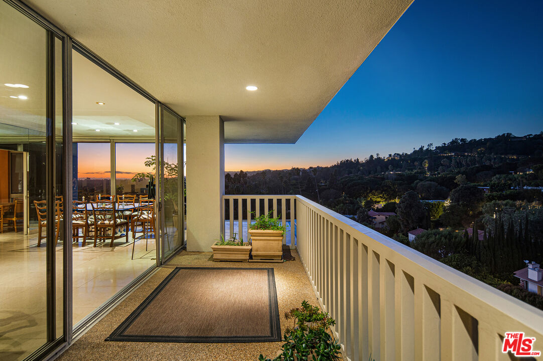 a view of balcony with patio