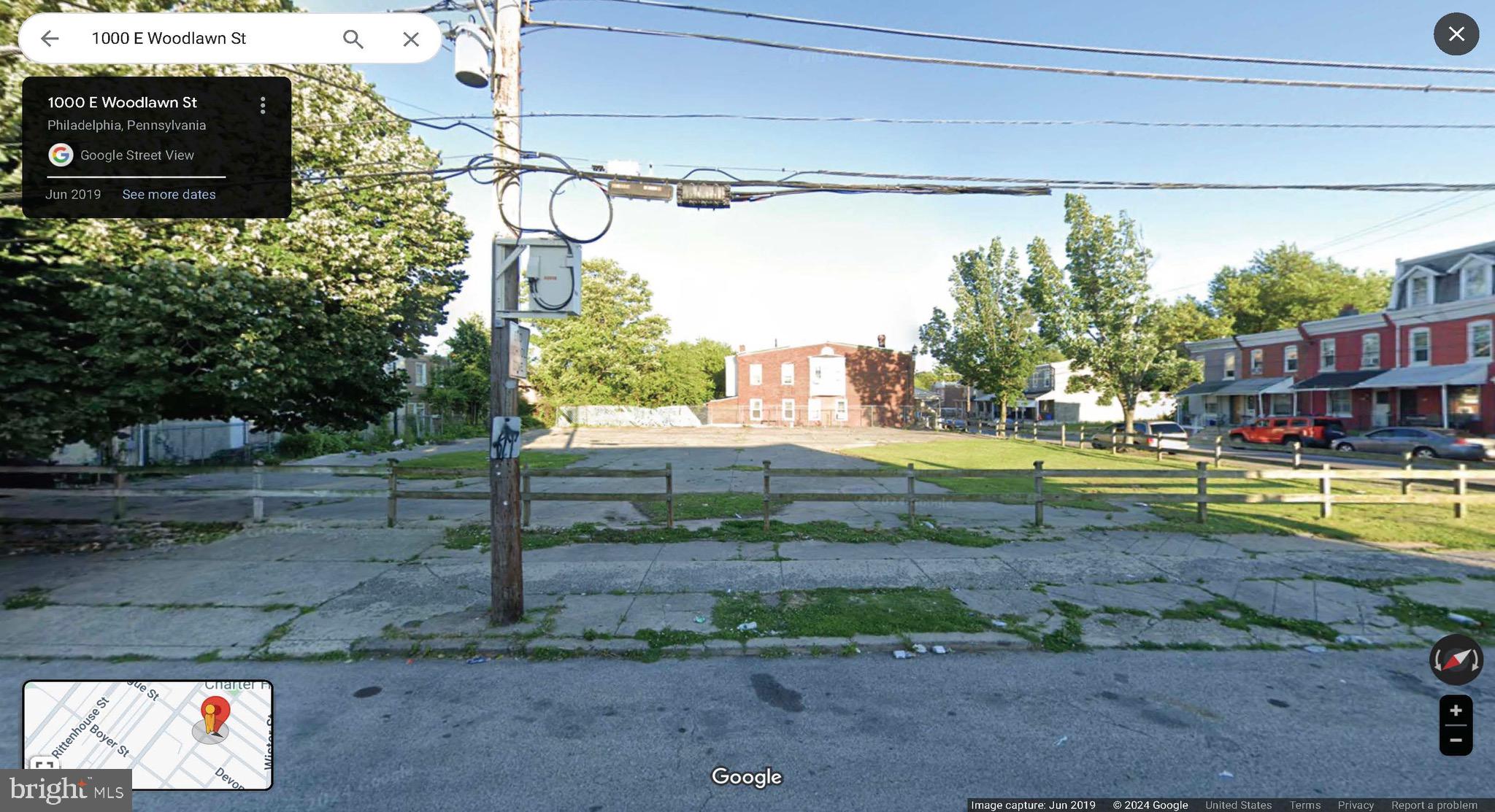 a view of a yard with a sink and green space