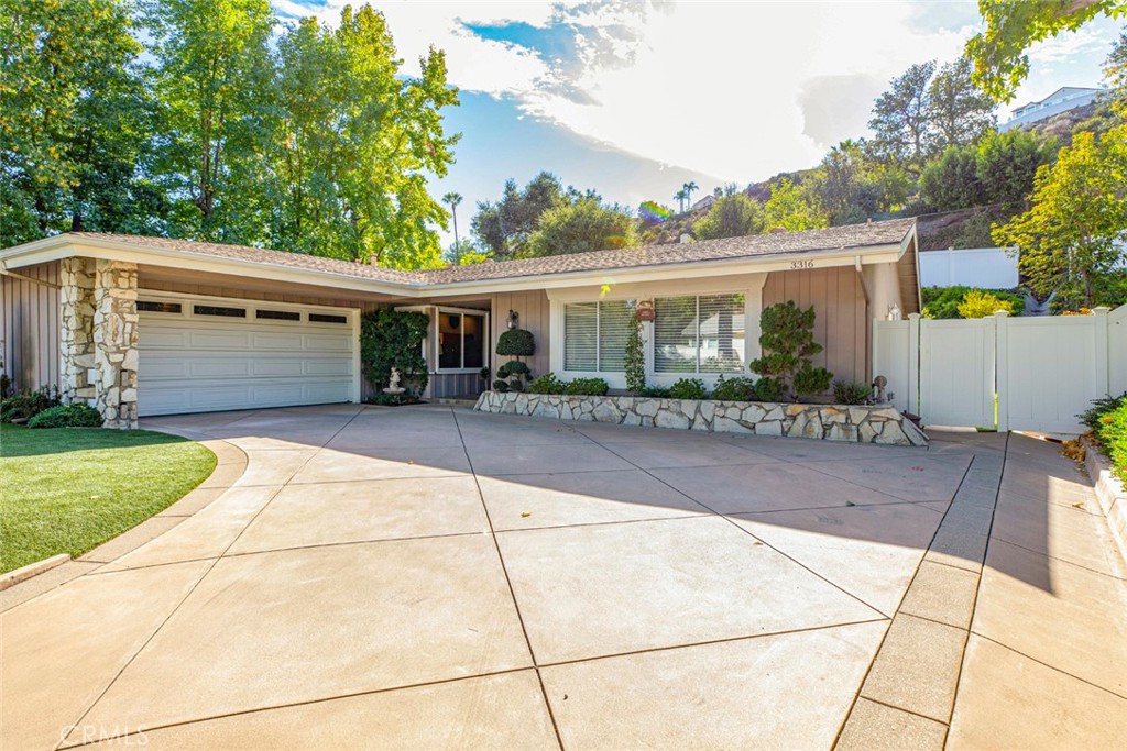 front view of a house with a patio