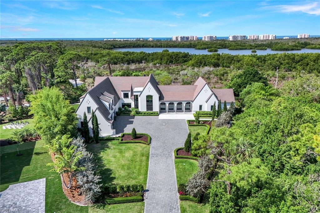 an aerial view of a house with garden space and outdoor space