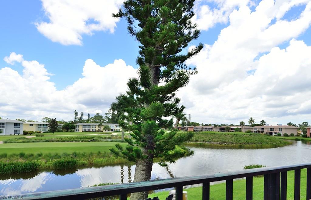 a view of a lake from a balcony