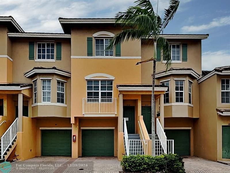 a front view of residential houses