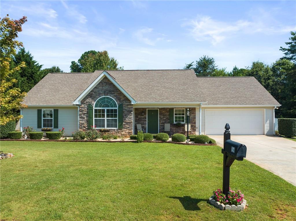 a front view of house with yard