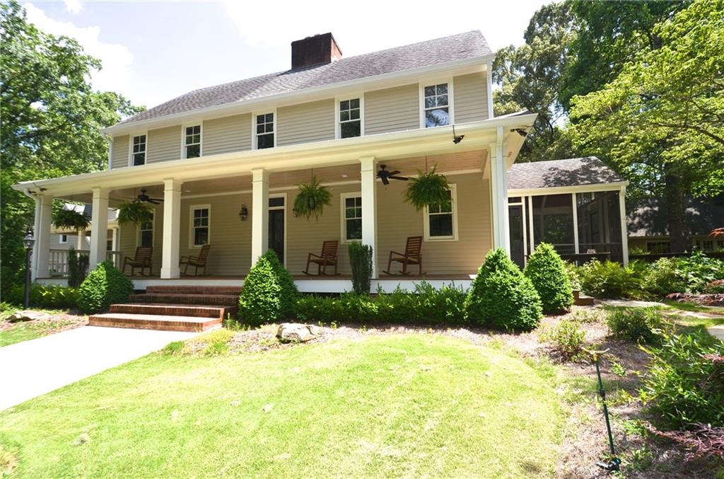 Double rocking chair porches across the front of the house.  New windows and Doors. This beautiful house sits on 4+ acres. 