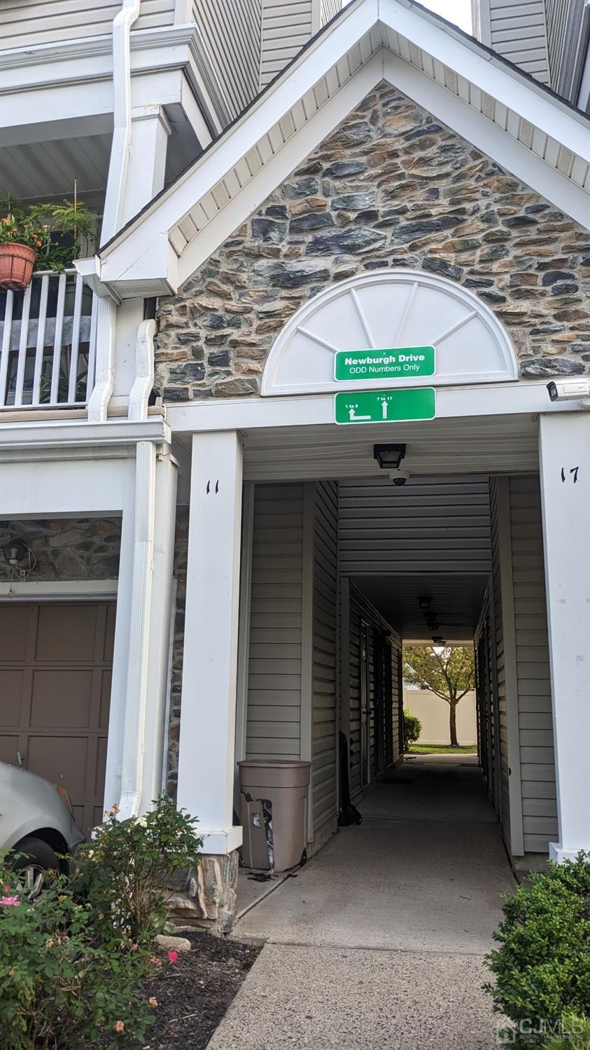 a front view of a house with a garage