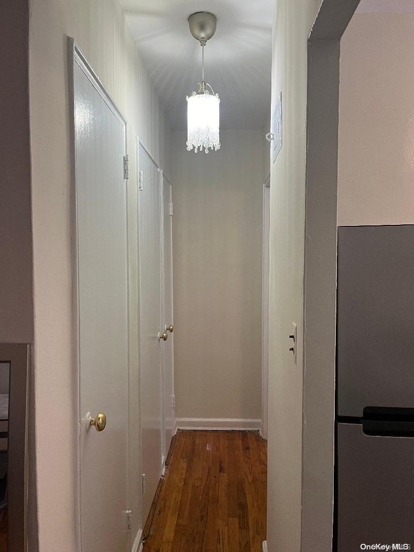 a view of a hallway with front door