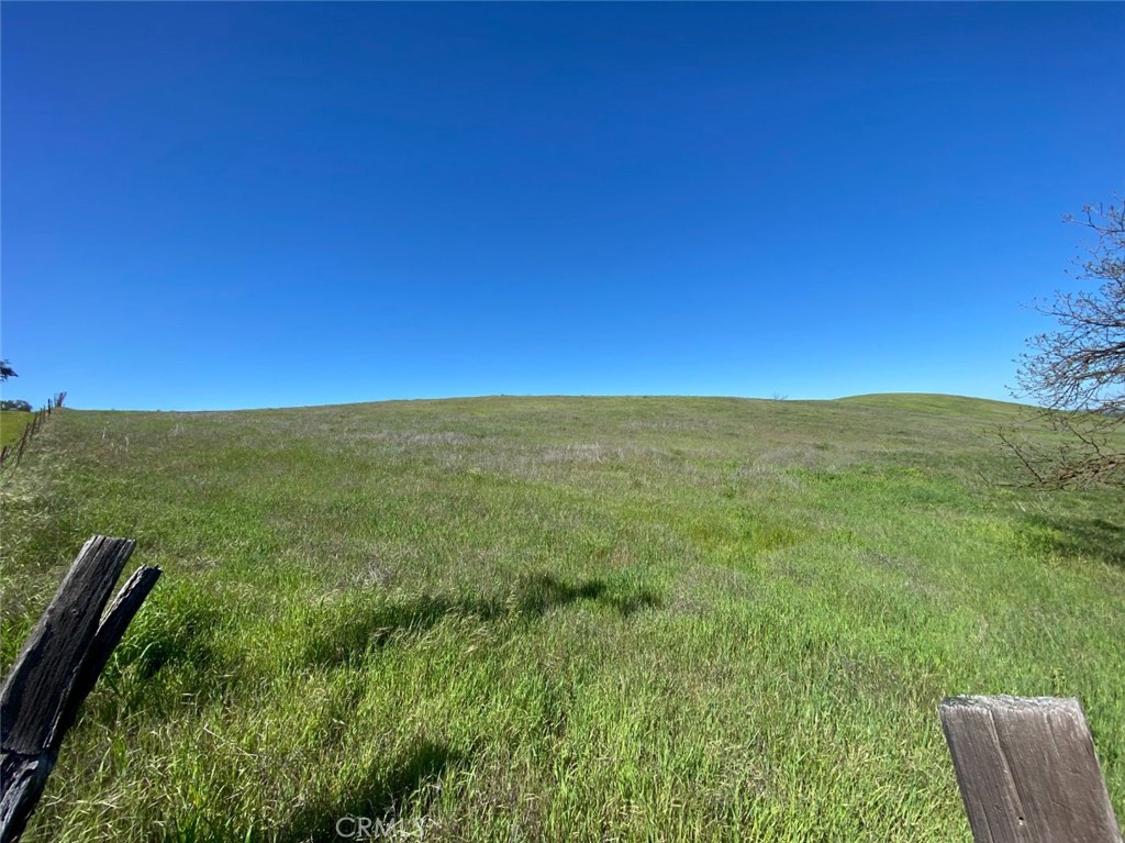 a view of a field with an outdoor space